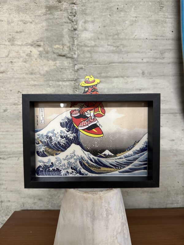 Cholo Riding Surf on Hokusai’s Wave Art Framed